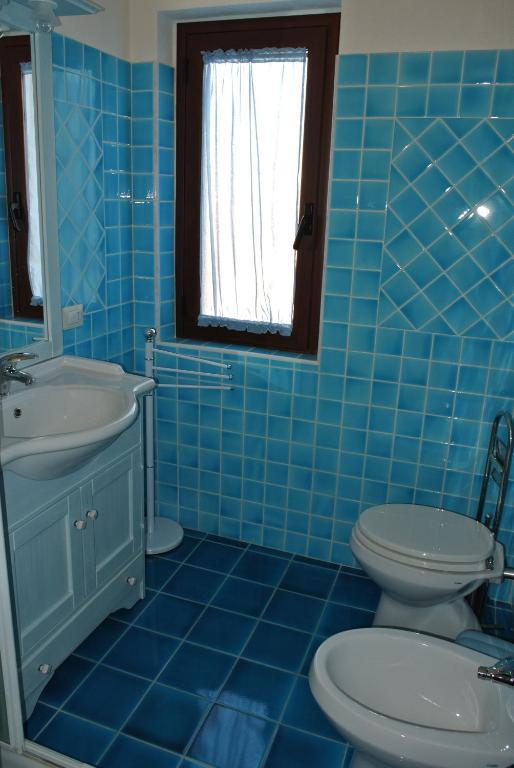 Case Vacanza Fenicotteri Сан-Теодоро Номер фото